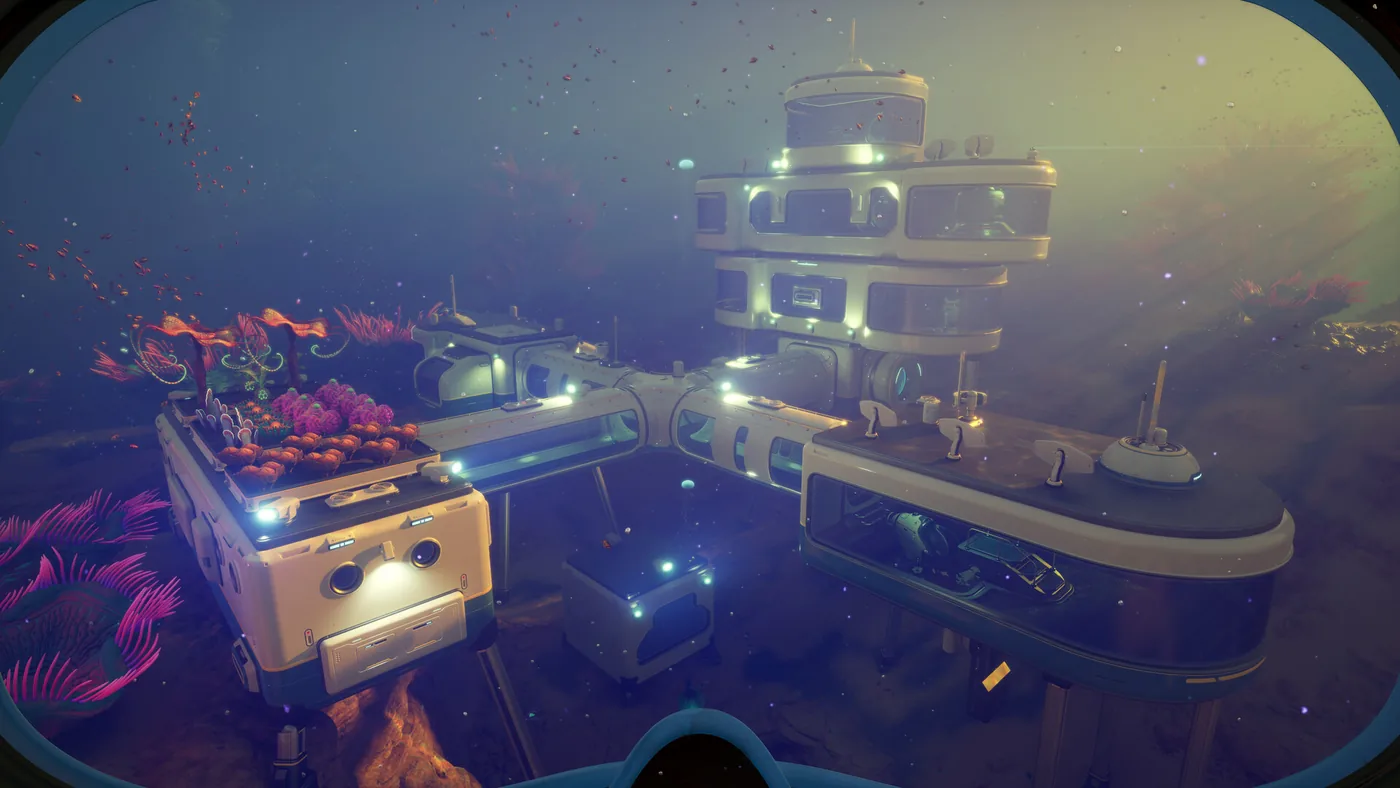 Subnautica 2 underwater base surrounded by bright alien reef life